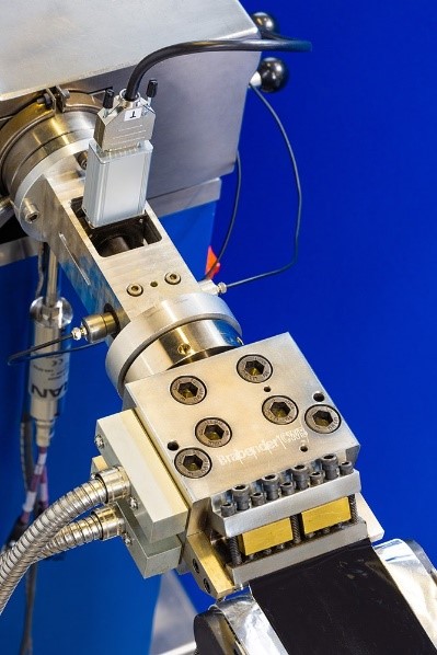 Battery electrode extrusion and monitoring system.